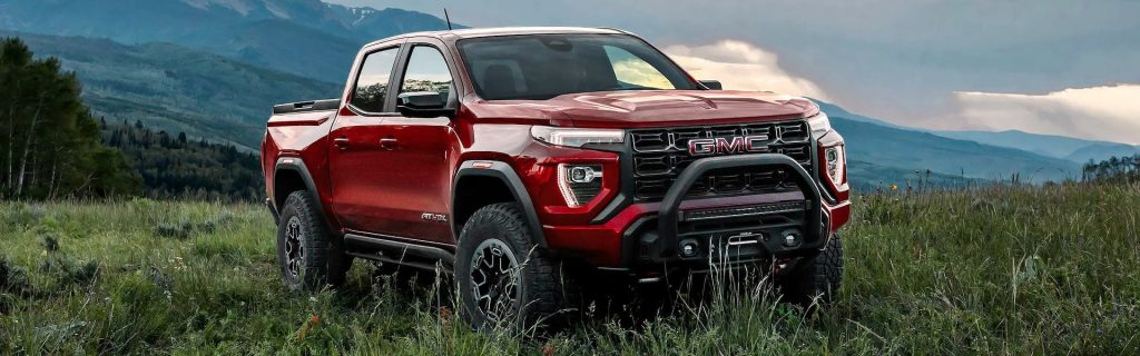 2025 GMC Canyon parked in a meadow